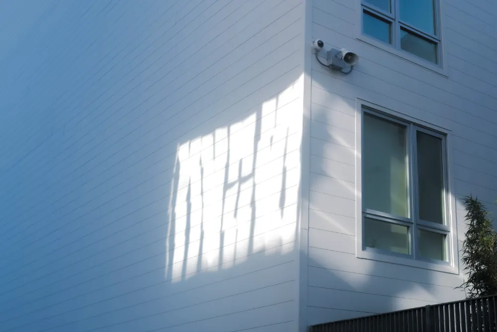 Photograph of sunlight falling on a white wall